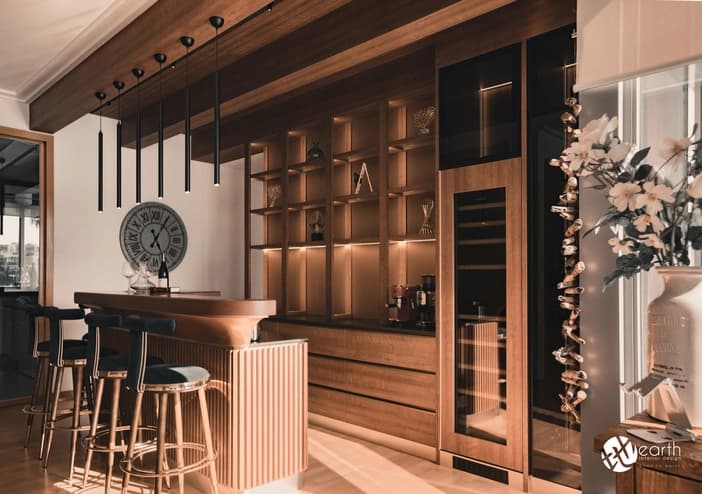 Wooden kitchen island with built-in shelves and stylish bar stools.