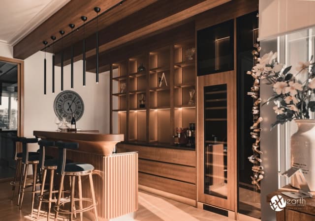 Wooden kitchen island with built-in shelves and stylish bar stools.